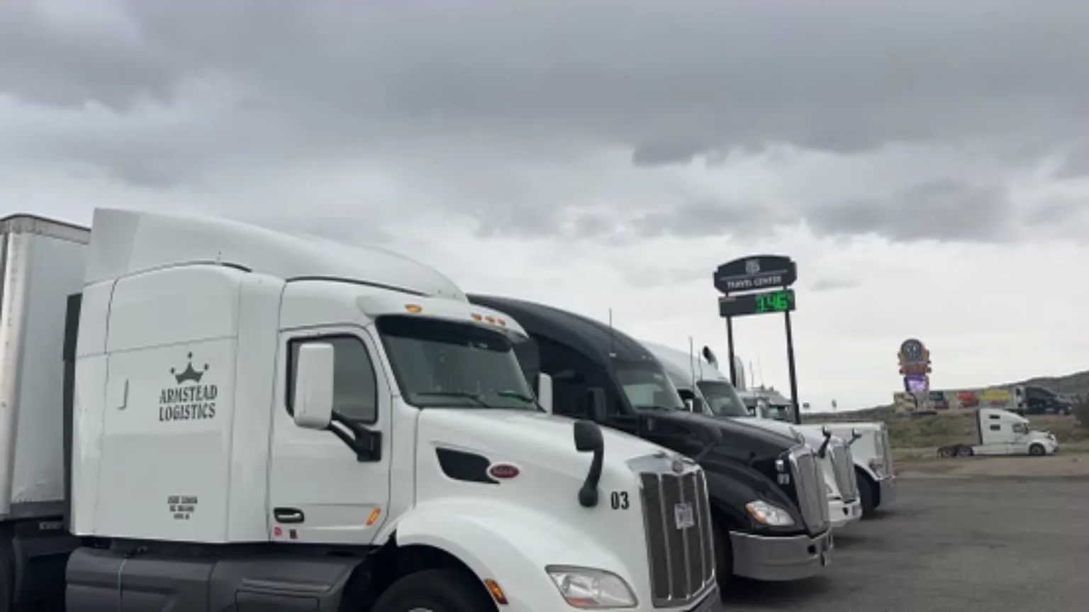 Armstead Logistics fleet parked on the road